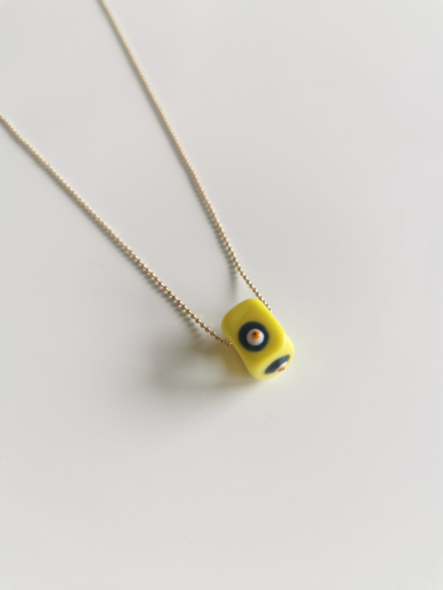 COLLIER MINI EYE JEUNE