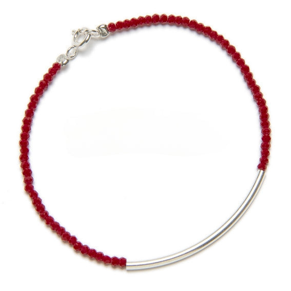 BRACELET CRISTAUX ROUGES ET PETIT TUBE